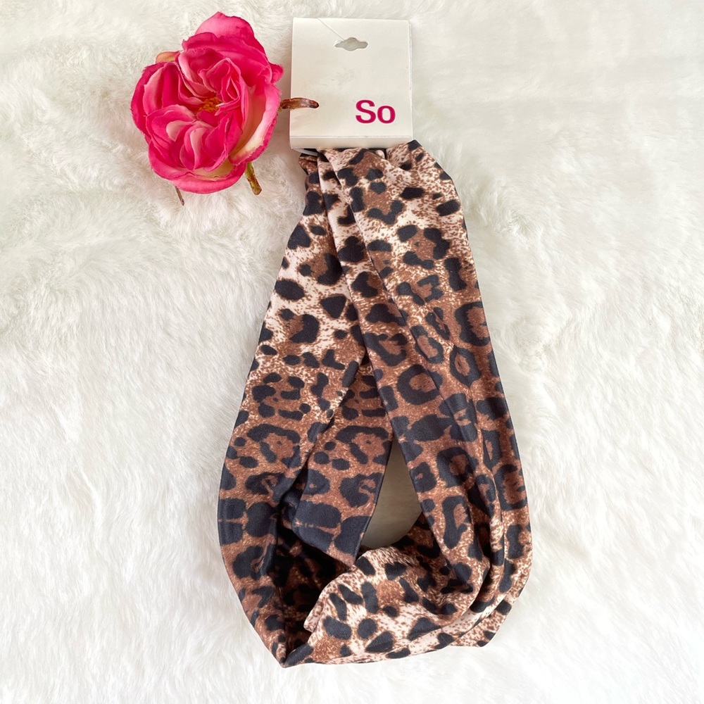 New with tags SO Cheetah Print HEAD WRAP. SOME STRETCH FOR COMFORT